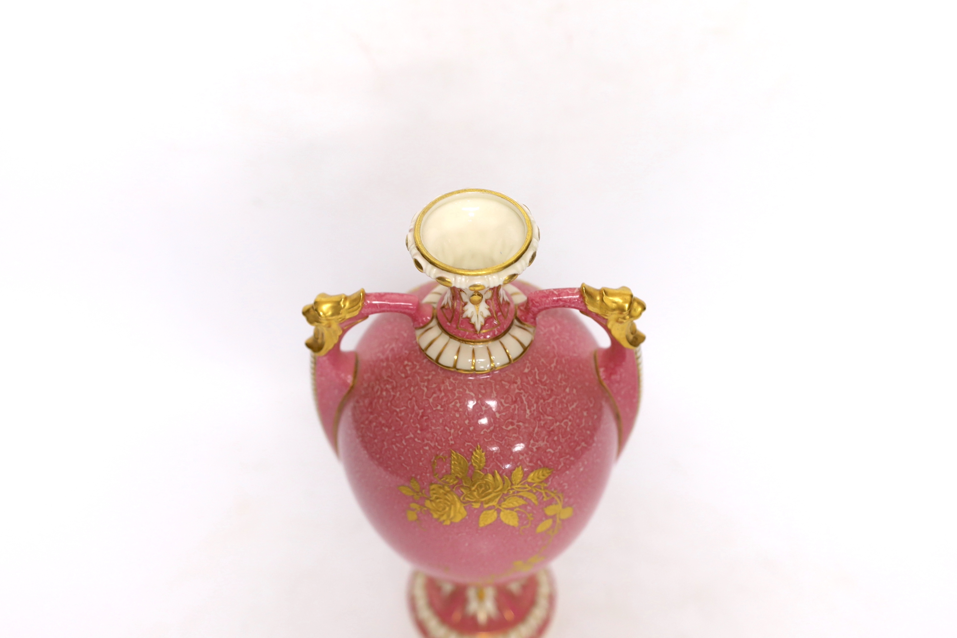 A Royal Worcester pink ground rose painted vase, signed Sedgley, 23.5cm